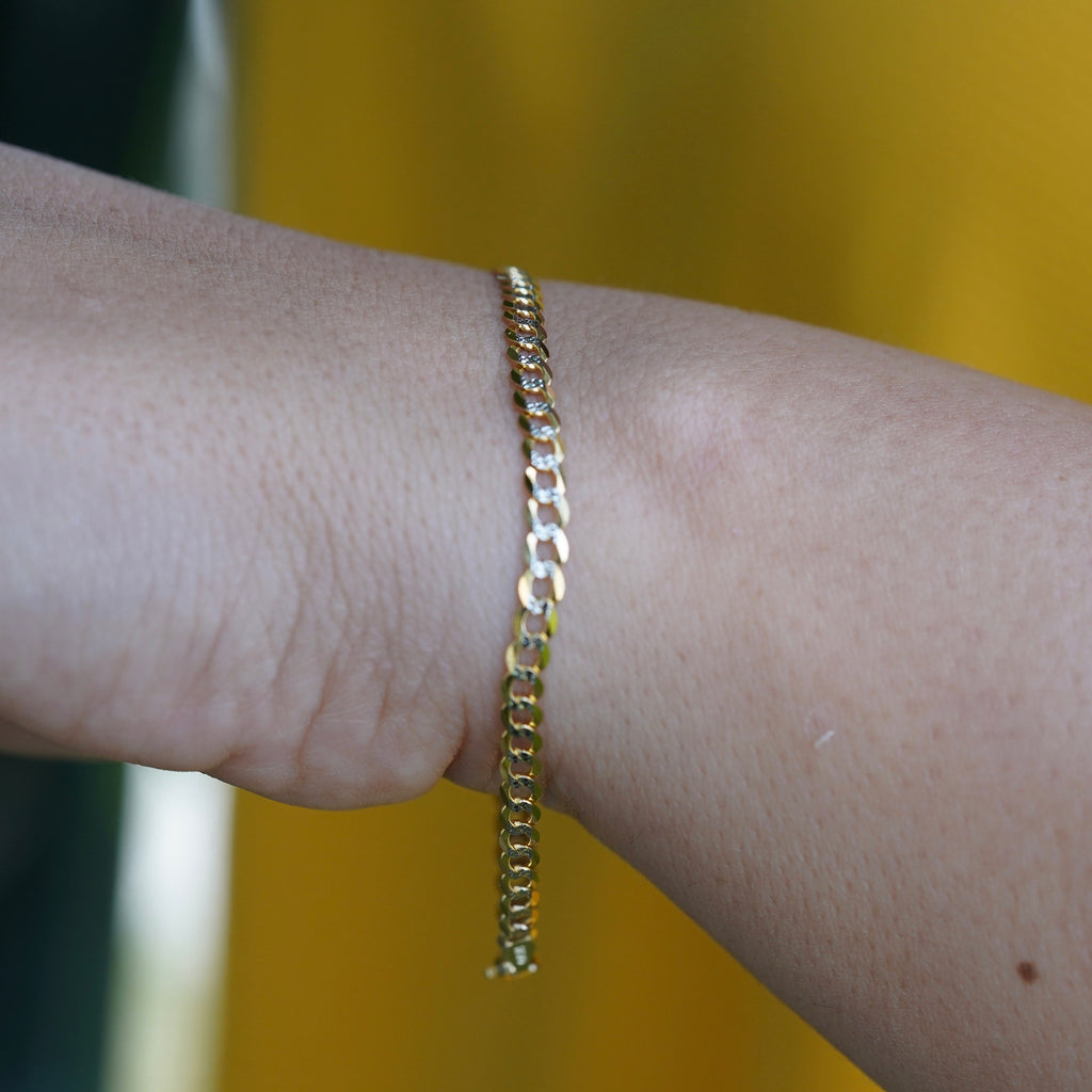 14K Real Gold 3.5mm Cuban White Pave Bracelet worn by a model, front view showing the bracelet’s elegant fit and Cuban link design.
