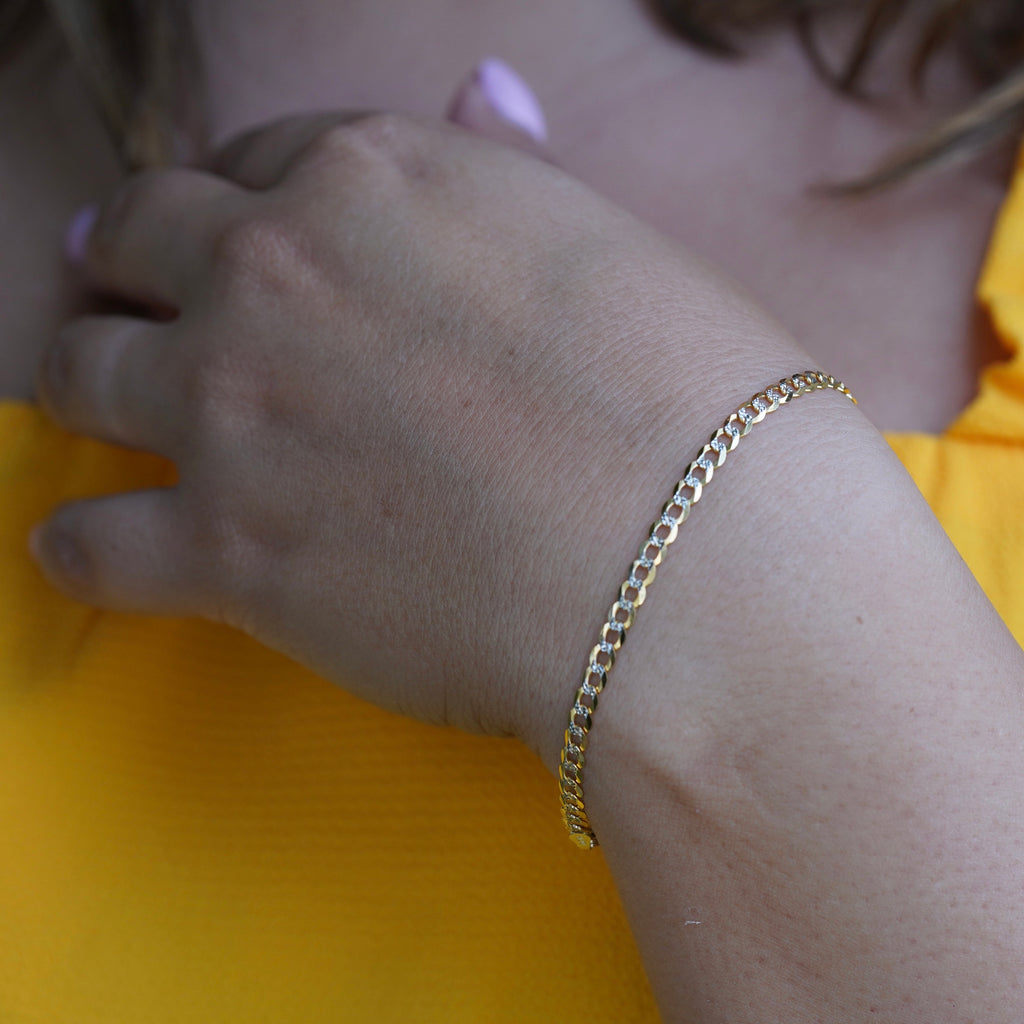 14K Real Gold 3.5mm Cuban White Pave Bracelet worn by a model, side view highlighting the thickness and pave details.