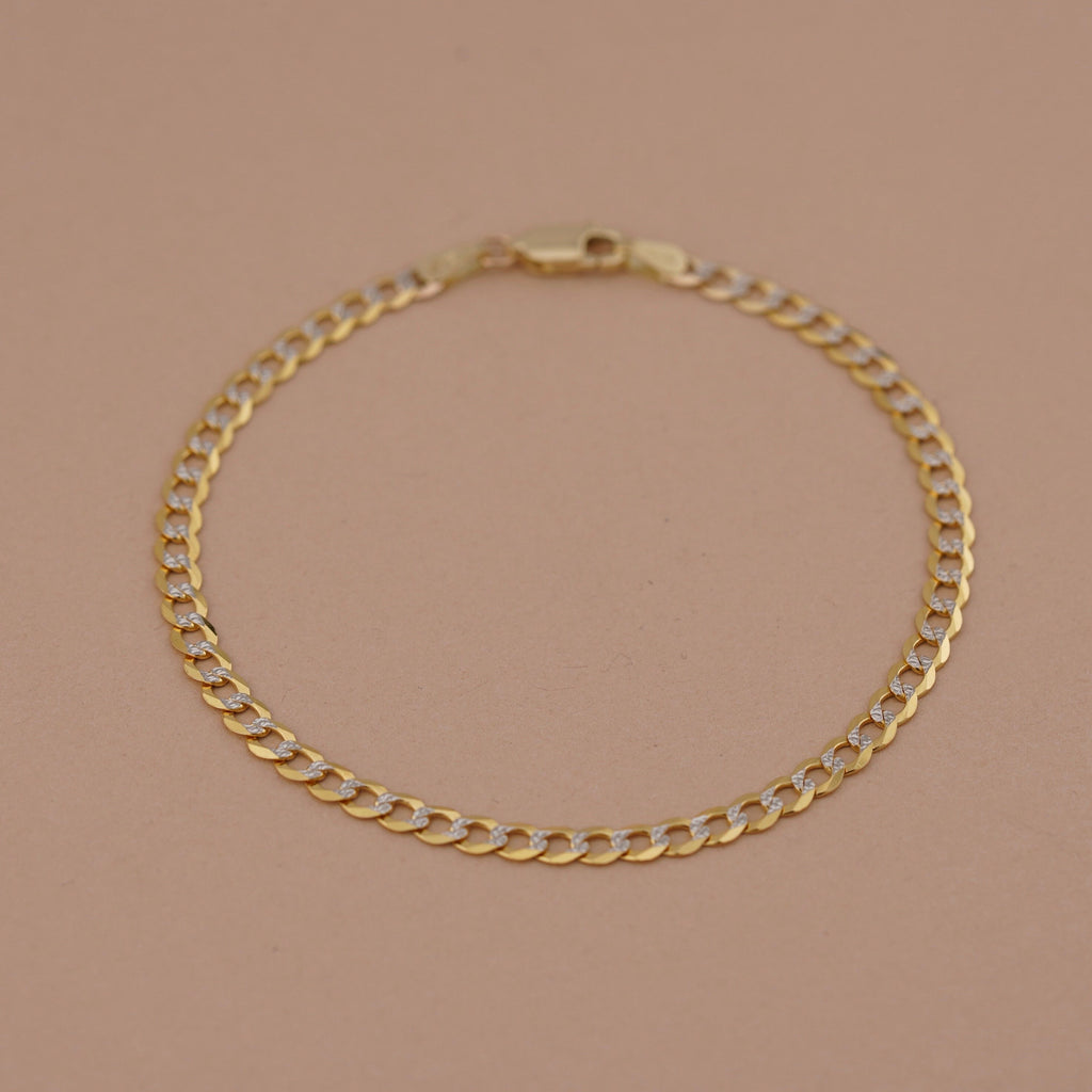 14K Real Gold 3.5mm Cuban White Pave Bracelet laid flat, highlighting the length, secure lobster clasp, and intricate pave accents.