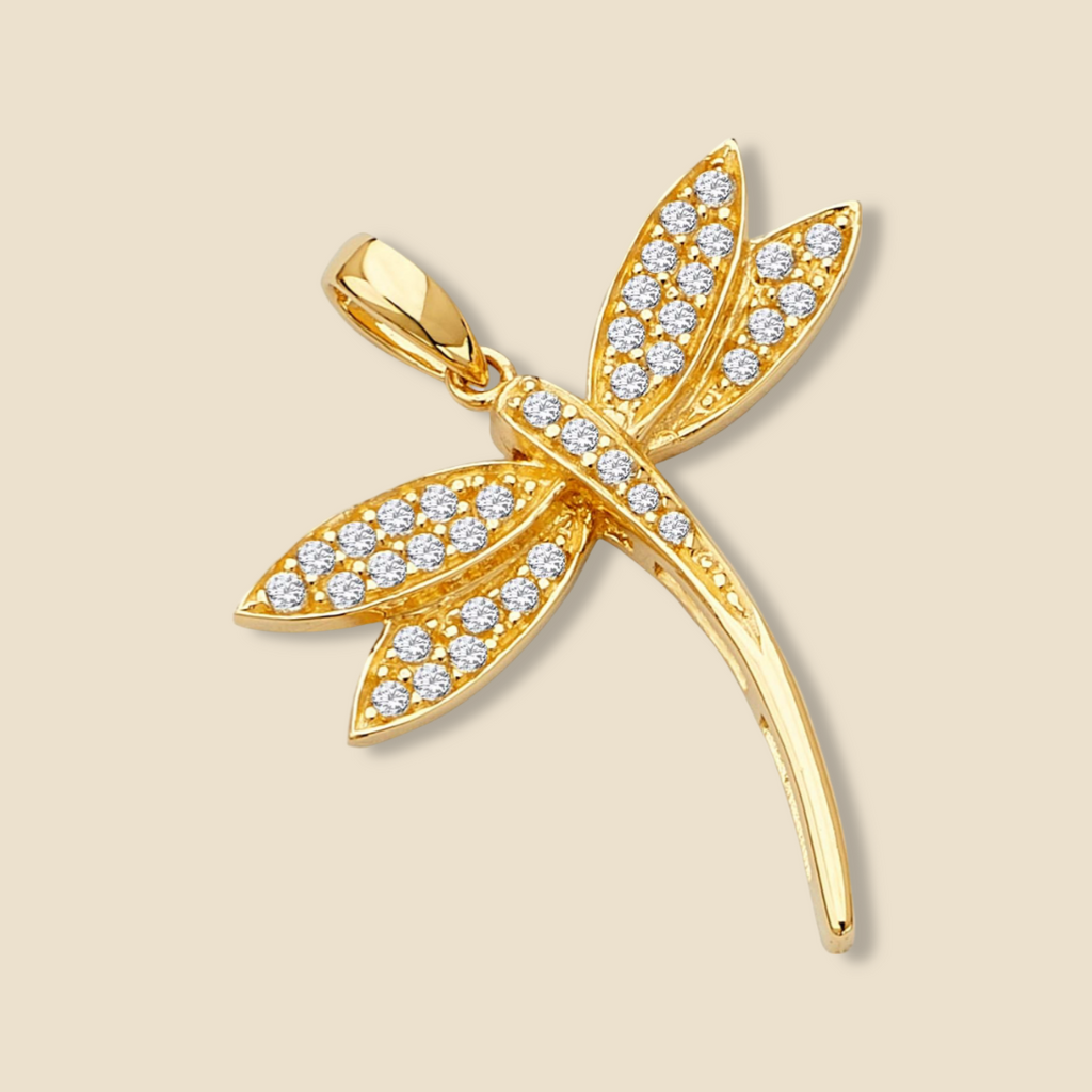14K Gold Dragonfly Pendant tilted view, showcasing cubic zirconia stones on plain background.