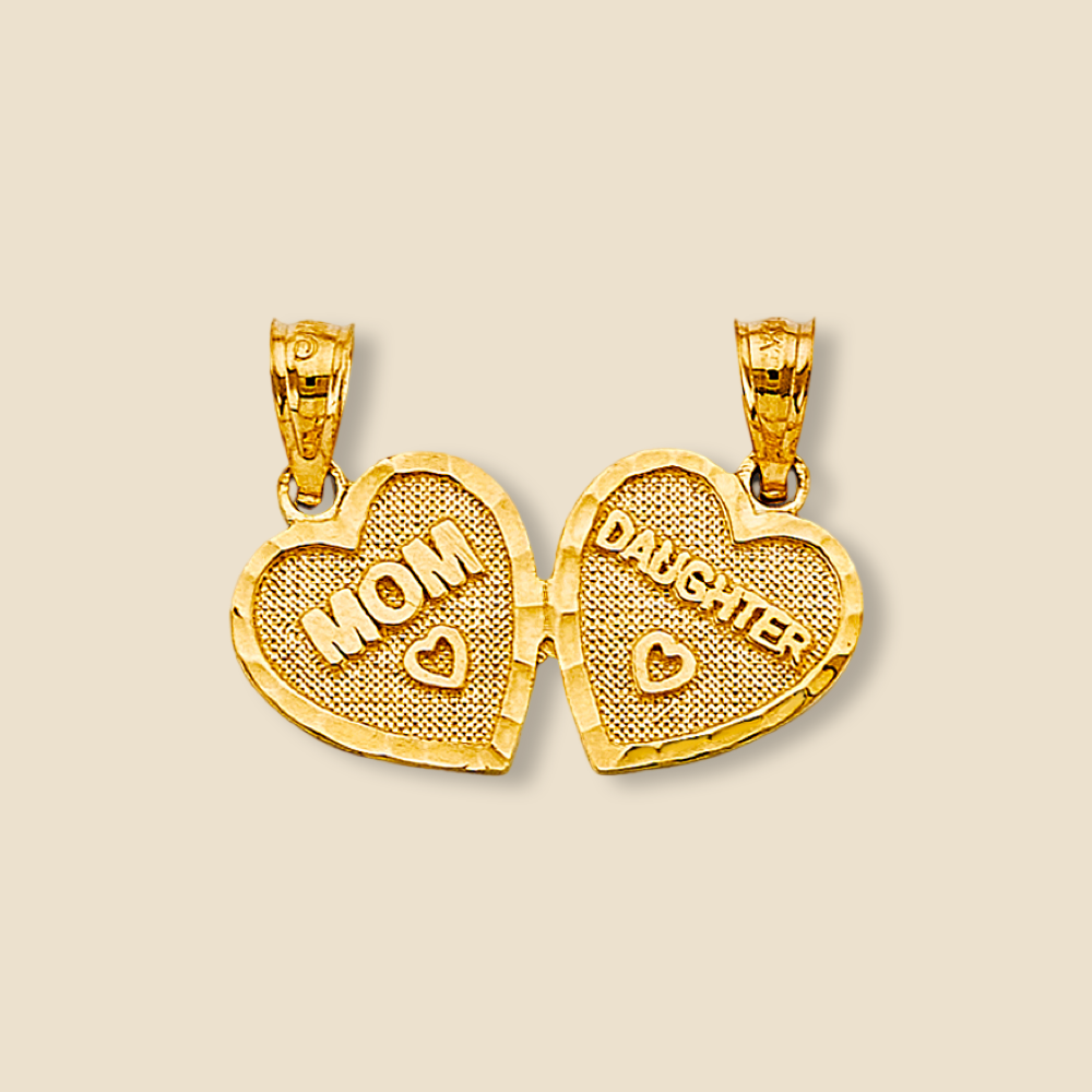 Close-up of 14K Yellow Gold Heart Mom and Daughter Pendant resting on a plain background, showcasing its graceful heart design and polished finish.