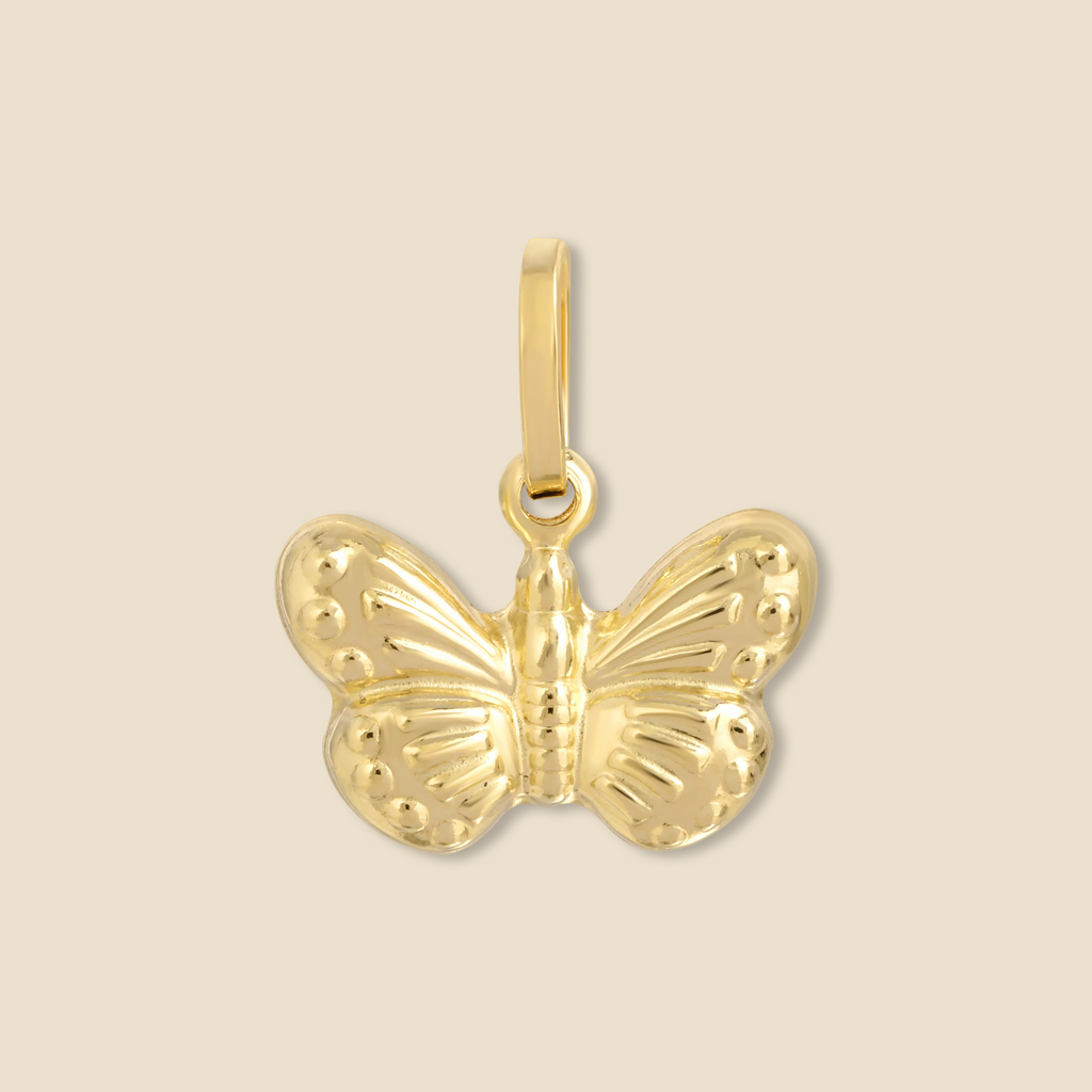 14K gold butterfly pendant displayed against a plain background, showcasing its polished finish and delicate wings.