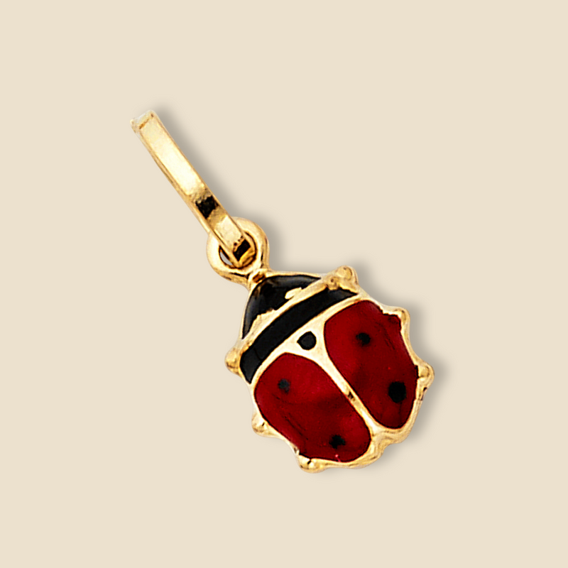 14k Real Gold Ladybird Charm with Red Enamel, tilted left view on a plain background.
