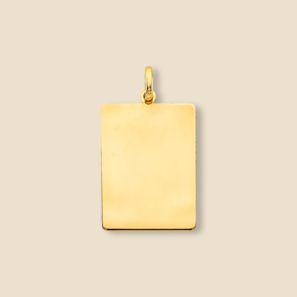 A 14K yellow gold engravable pendant photographed on a plain background, with crisp lighting that accentuates its rectangular shape and polished surface for a clean, studio-style look.