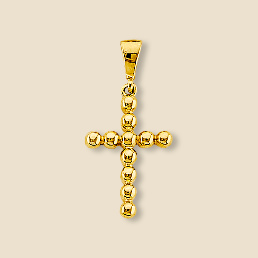 14K yellow gold beaded cross charm on a plain background, emphasizing the texture and beadwork in the cross silhouette.