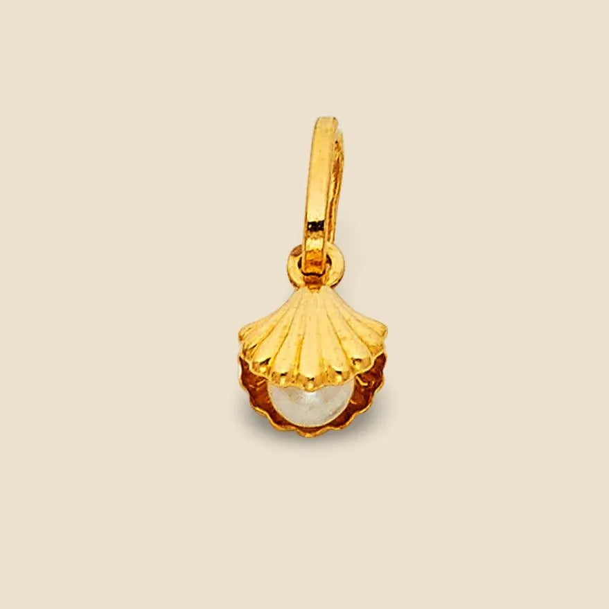 A close-up image of a 14K Solid Gold Pearl Pendant against a plain background, showcasing its smooth, lustrous pearl set in polished yellow gold.