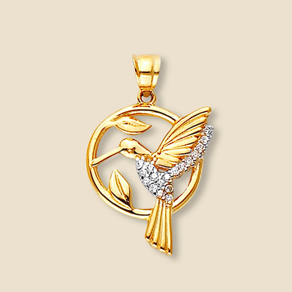 Isolated view of 14K gold hummingbird pendant on a plain background, showcasing fine craftsmanship and smooth finish.