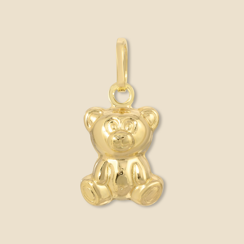 14K Yellow Gold Bear Pendant on a plain background, showcasing its smooth polished finish and adorable teddy bear design.