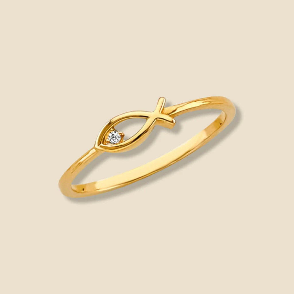 14K solid gold Ichthys fish ring photographed on a plain background, emphasizing its refined craftsmanship and high-polish finish.