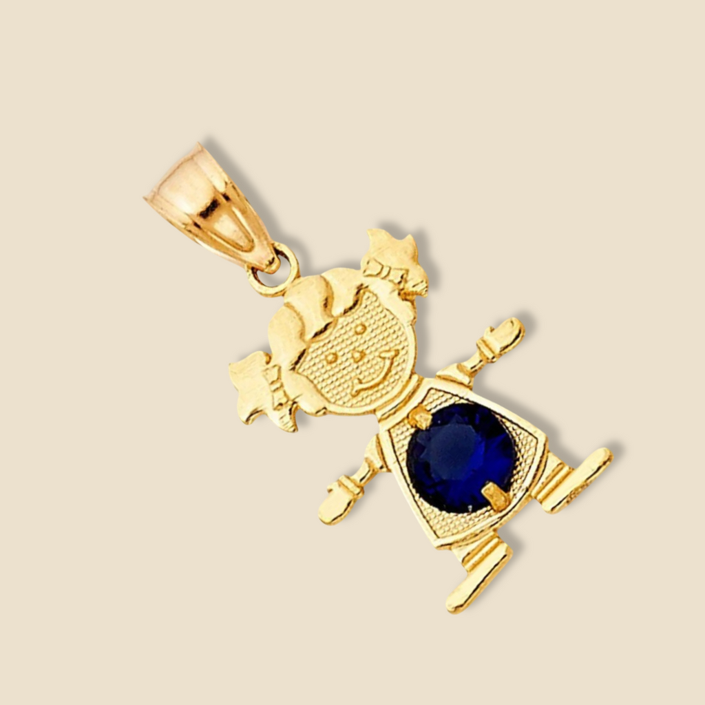 14K Solid Gold Girl Charm with deep dark blue cubic zirconia stone, resting on a plain background to highlight the sparkle and warmth of the gold.