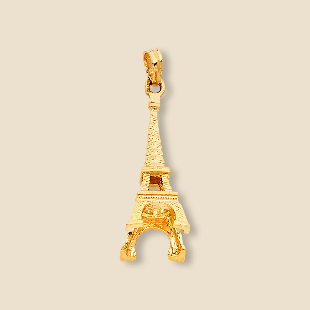 A 14K yellow gold Eiffel Tower pendant displayed against a plain background, highlighting its intricate detailing and polished finish.