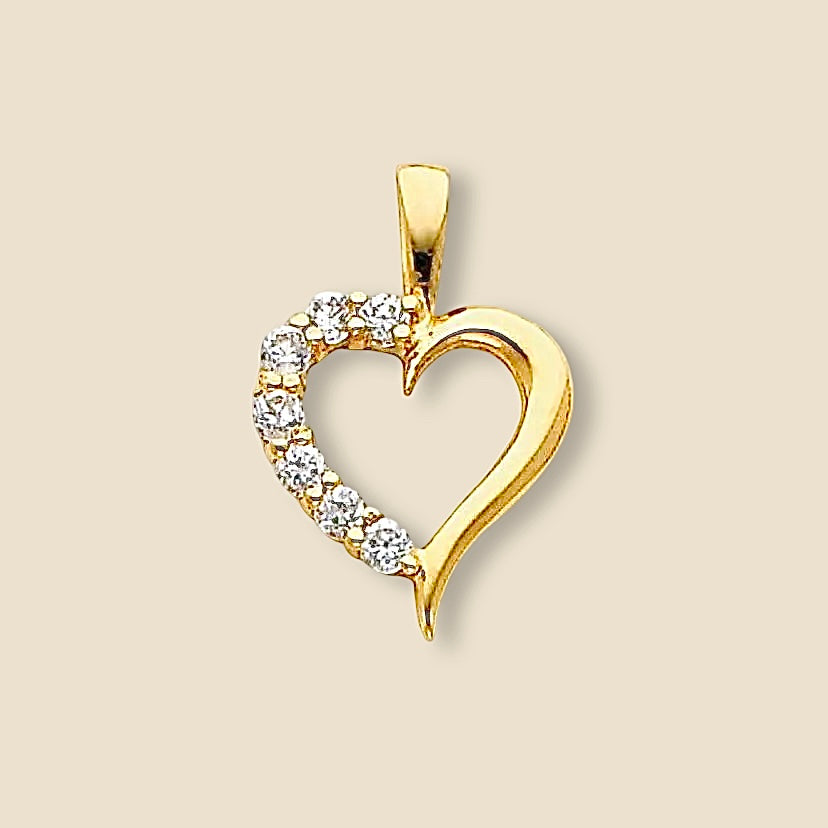 14K Solid Yellow Gold Tiny Heart Charm featuring a polished finish and a sparkling cubic zirconia gemstone, displayed against a plain background to showcase its dainty and timeless design.