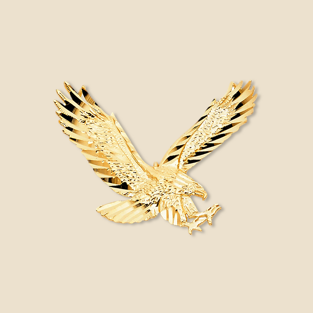 14K Solid Gold Eagle Pendant displayed against a plain background, showcasing its finely detailed wings and polished gold finish, symbolizing strength and freedom.