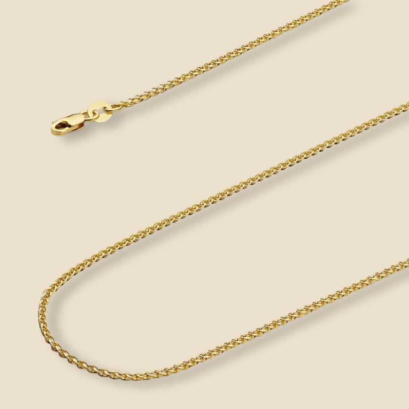 14K yellow solid gold wheat chain necklace with flat open 1.5mm design, shown against a clean plain background to highlight the yellow gold color contrast and polished finish.