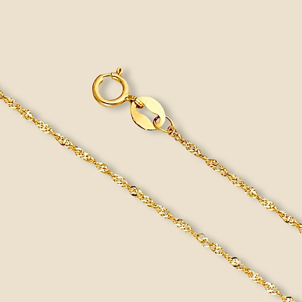 14K Yellow Gold Singapore Chain Necklace displayed on a plain background with a twisted rope design.