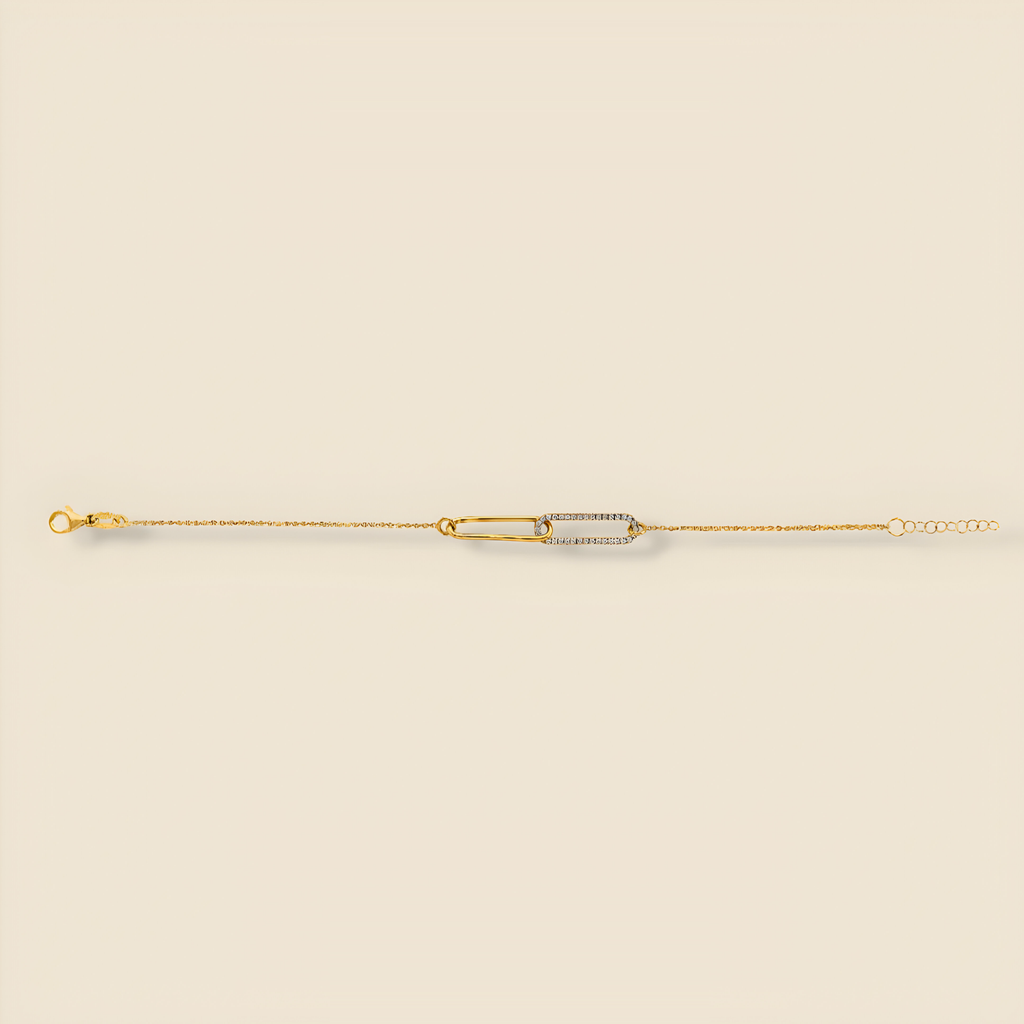 14K gold paperclip bracelet displayed on a plain background with polished links reflecting light.