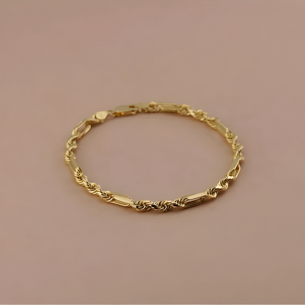14K Yellow Gold 4mm Figaro Rope Chain Bracelet displayed on a clean background, highlighting the shine and texture of the gold links.