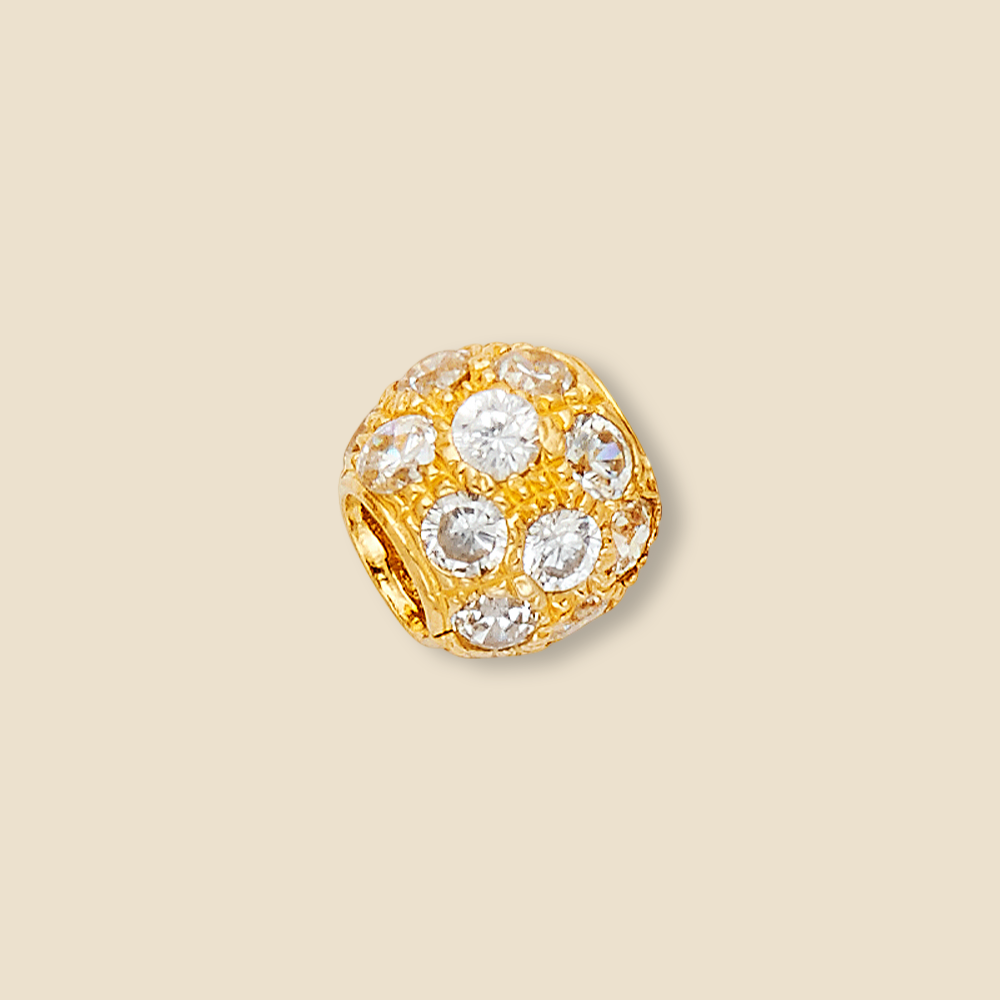 Medium-sized 8mm 14K yellow gold bead charm pendant with sparkling cubic zirconia details and a diamond-cut polished finish, photographed on a plain background to showcase its timeless elegance and craftsmanship.