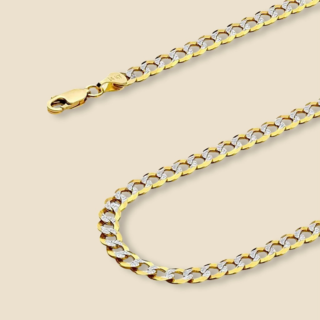 Close-up of a 14K Gold Cuban Link Bracelet with white pave design, 7 inch length, on a plain background.