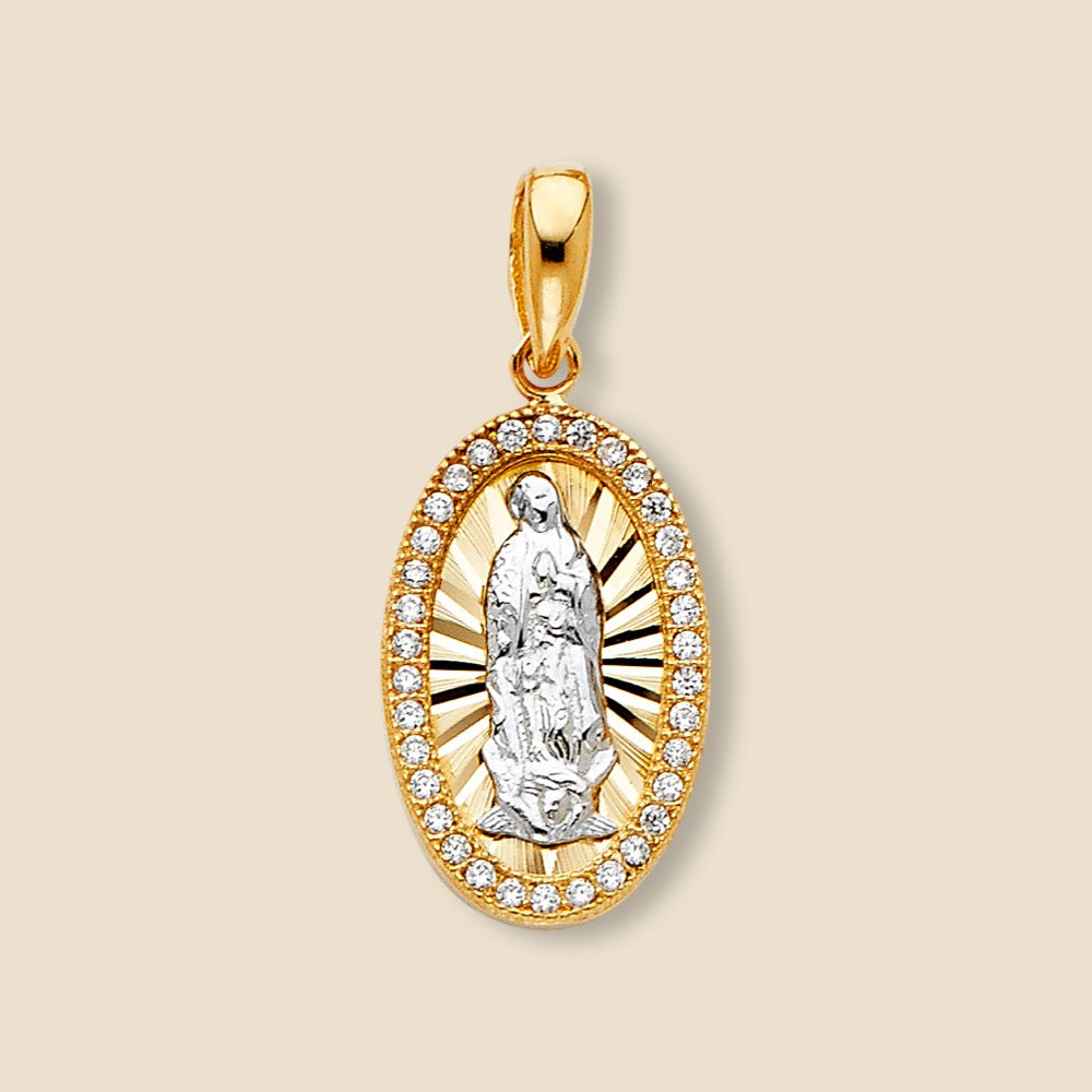 14K two-tone gold Our Lady of Guadalupe charm on a plain background, showcasing its bright CZ stones, Virgin Mary engraving, and polished finish.