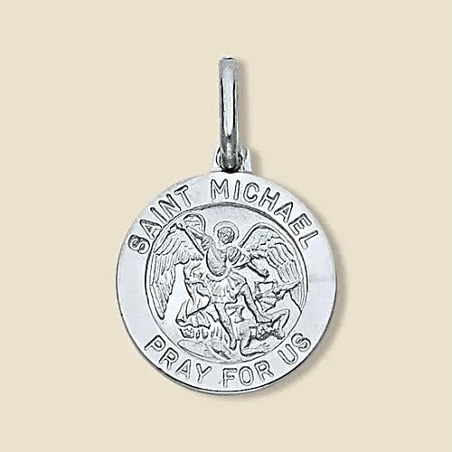 A 14K White gold Saint Michael medallion pendant with a polished finish, showcasing the intricate engraving of Saint Michael the Archangel, photographed against a plain white background to highlight its refined details and craftsmanship.