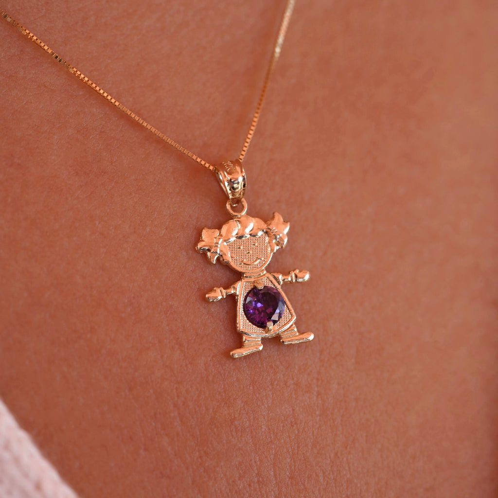 Woman wearing 14K solid gold girl charm with February light purple birthstone pendant on a necklace chain.