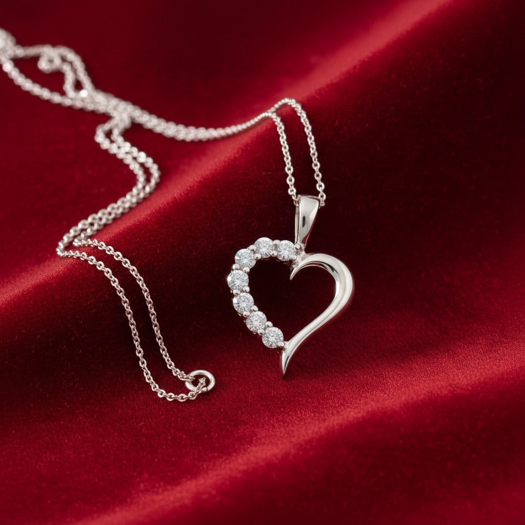14K White Gold CZ Heart Pendant with White Gold Chain displayed on red velvet background.