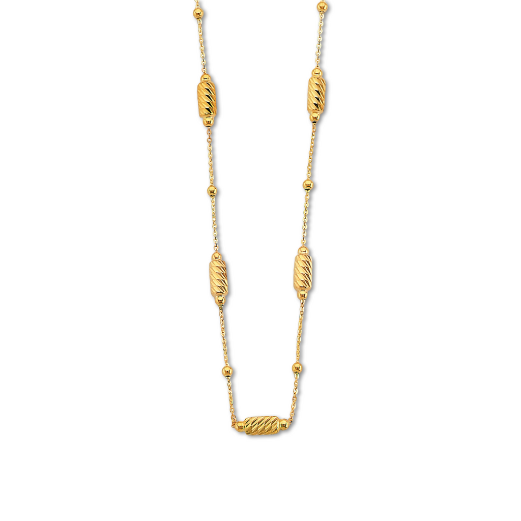 14K yellow gold long bead necklace displayed on a white background, showing its diamond-cut beads and polished shine.