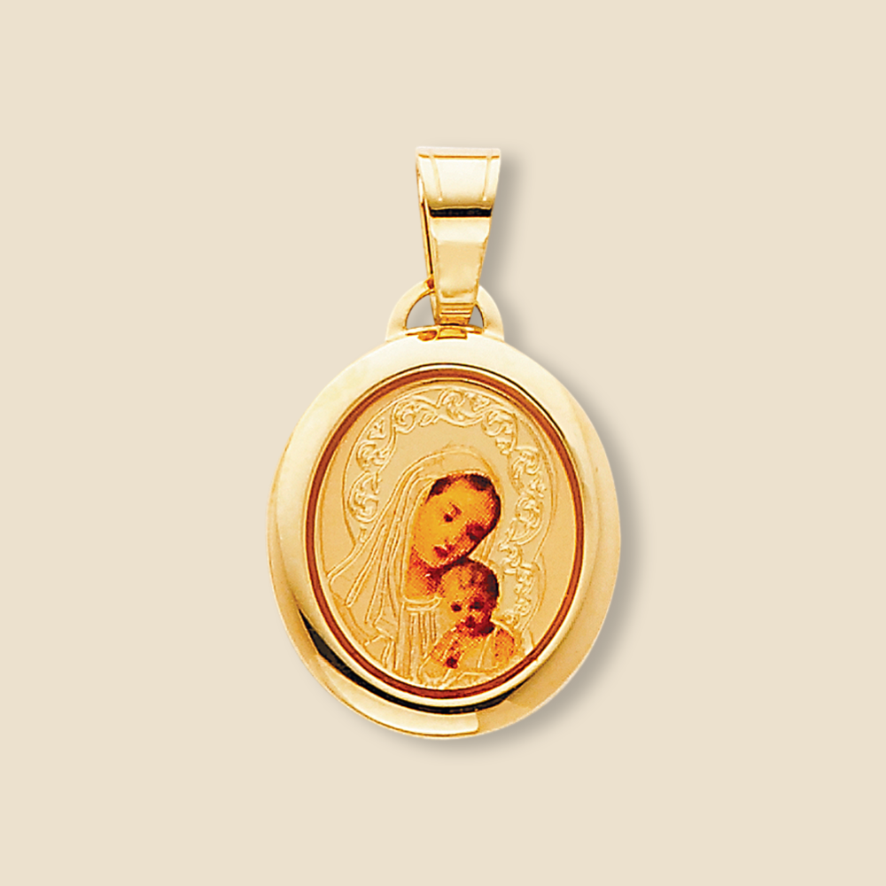 Solid 14K yellow gold Virgin Mary pendant on a plain background, showing the fine oval design and Marian engraving.