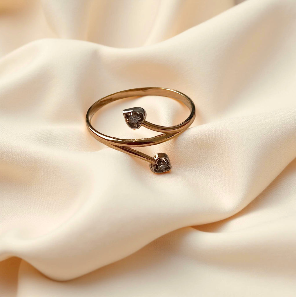 14K two-tone gold ring with brilliant cubic zirconia stones, displayed against a neutral backdrop, showcasing polished finish and 13mm wide band.