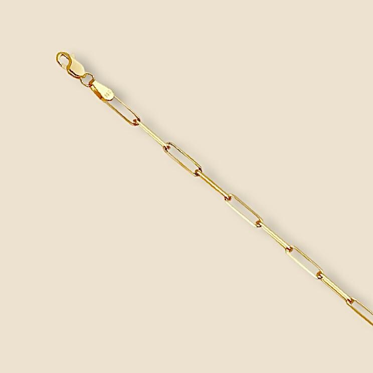 14K Yellow Gold Paperclip Chain displayed flat on a plain background, showcasing its polished finish and triangle-shaped 2.7mm links in elegant detail.