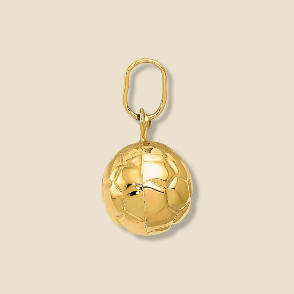 Side view of 14K gold 3D soccer ball pendant on a plain background showing detailed panel texture and polished finish.