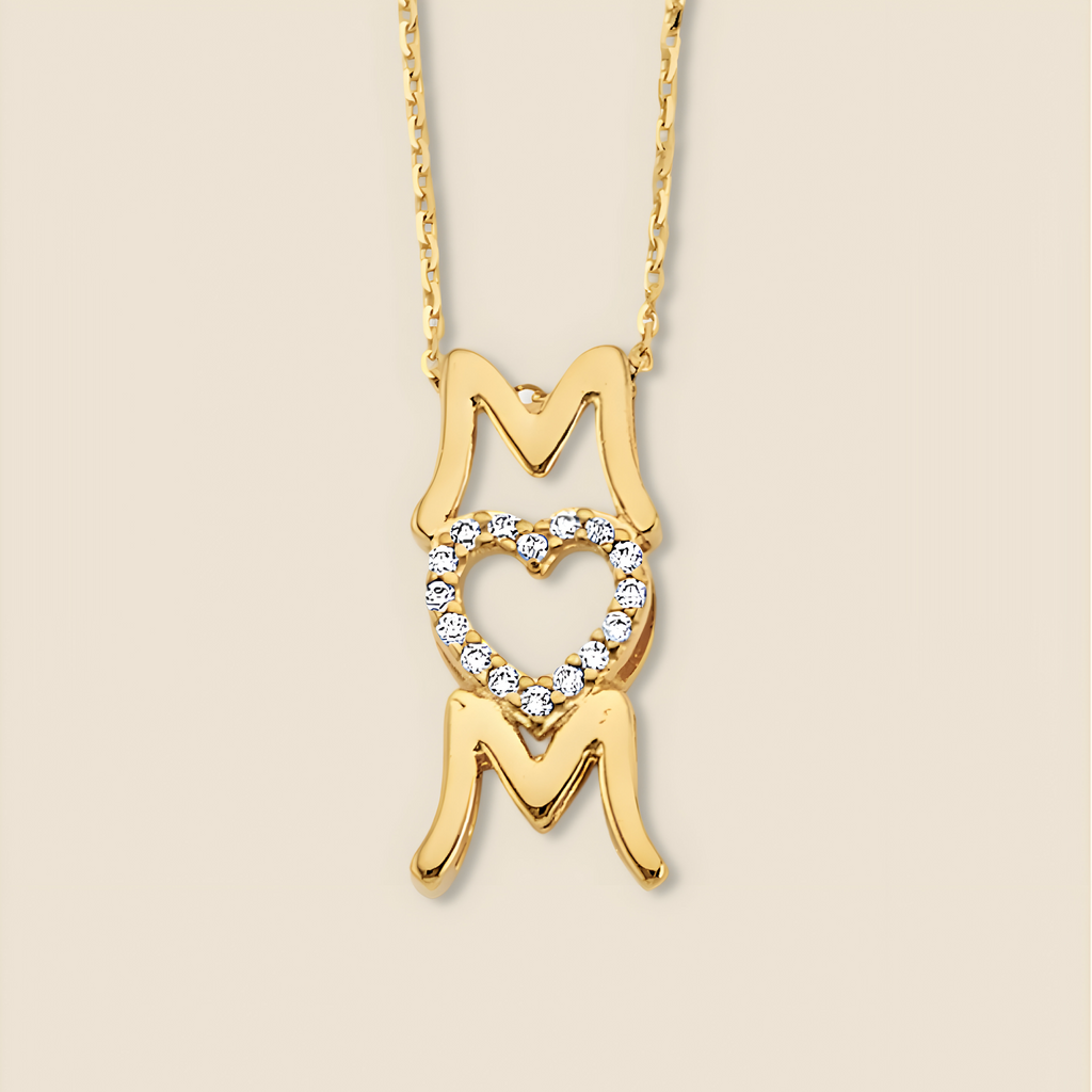 14K gold CZ Mom necklace displayed on a plain background, showcasing its radiant design and sparkling script pendant.