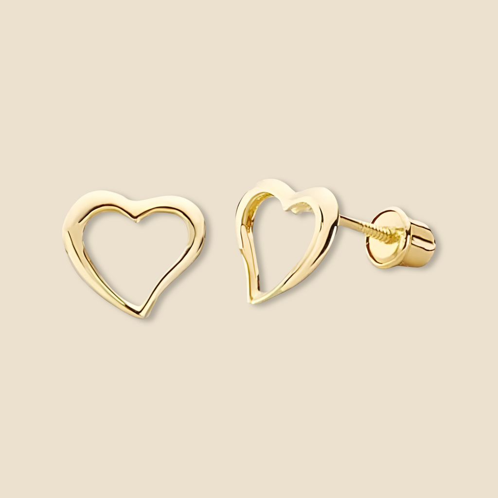 14K yellow gold heart stud earrings photographed on a plain background, highlighting their smooth polished surface and delicate shape for a clean, product-focused presentation.
