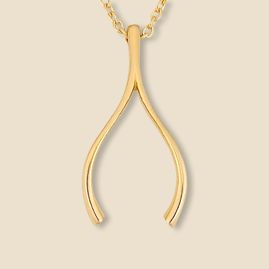 14K Gold Wishbone Charm Pendant on a plain background, showcasing its polished finish and elegant design, a symbol of luck and good fortune.