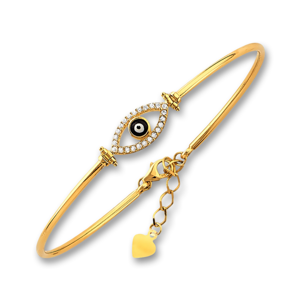 Dainty evil eye gold bangle resting on a white background, catching light across its sleek oval form—crafted in real 14K gold and designed for everyday elegance.