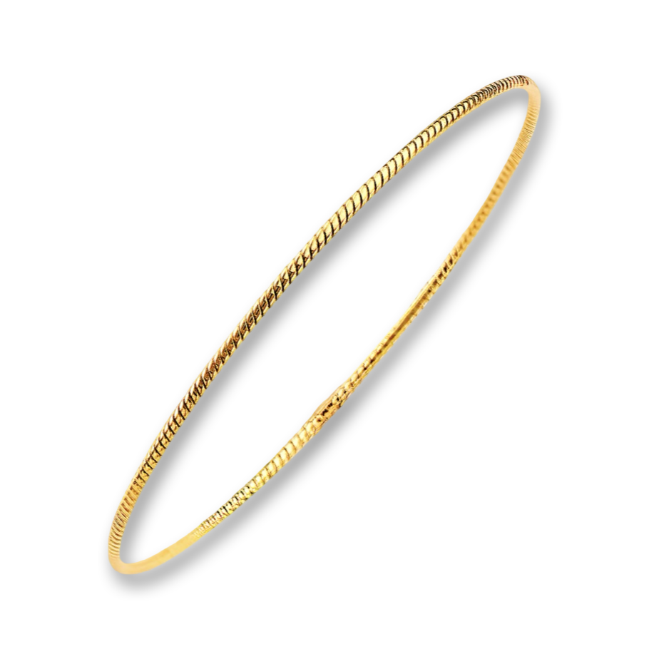 A dainty 14K yellow gold braided bangle bracelet with a delicate 1.5mm rope design, placed against a plain background. The warm golden tone and intricate twist pattern reflect light softly, highlighting the elegant craftsmanship.