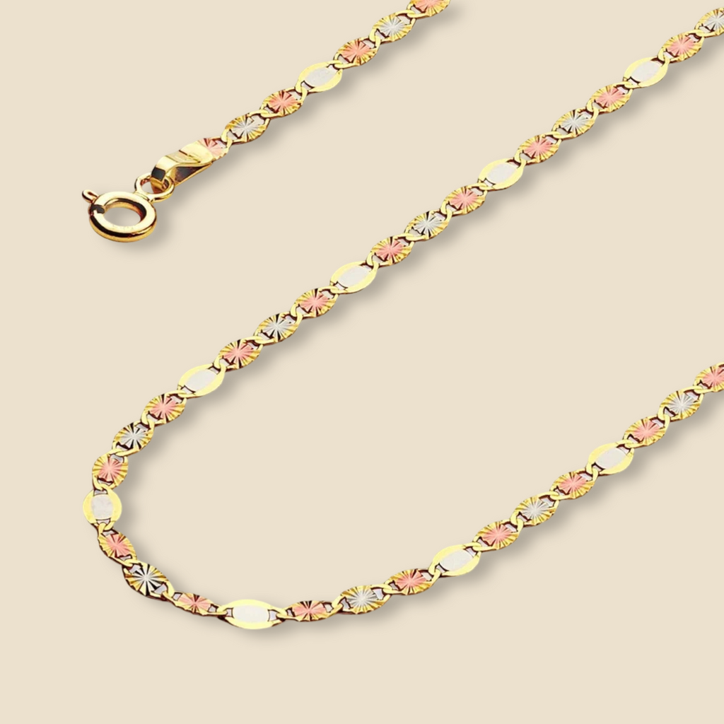 A stunning 14K solid gold Valentino chain necklace displayed on a clean, plain background. This elegant 2mm chain features a polished finish, reflecting light beautifully. Crafted in Italy, the delicate yet durable design makes it perfect for layering or wearing solo. Available in lengths from 16 to 24 inches, with a secure spring ring clasp for a comfortable fit.