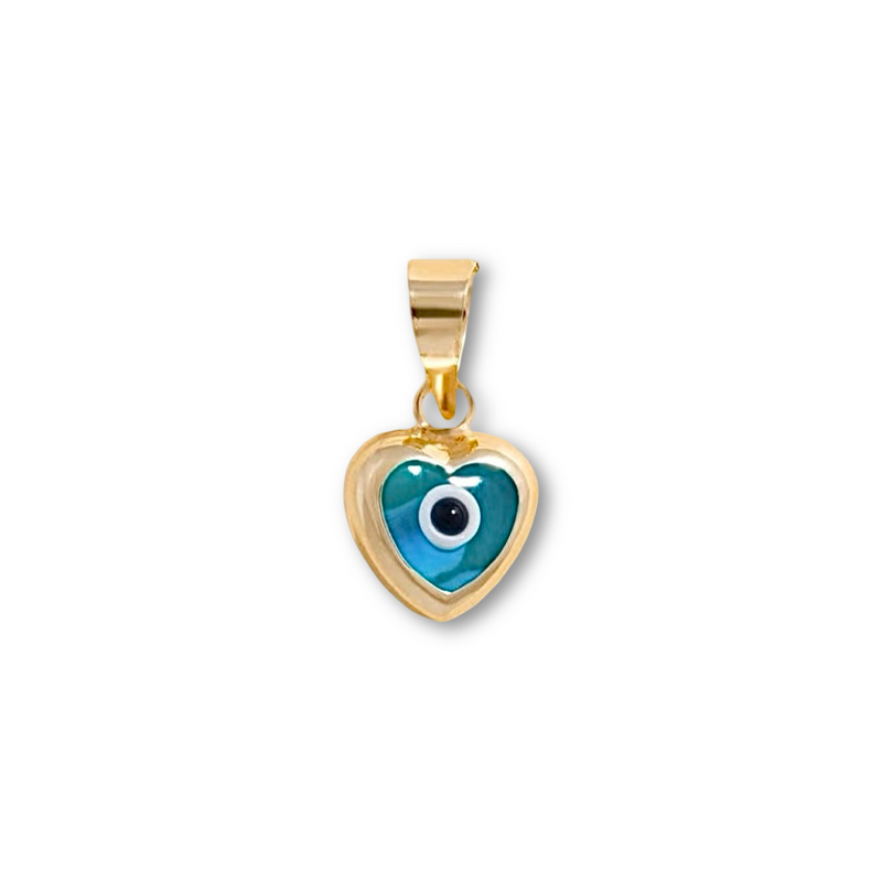 A close-up of the 14K yellow gold heart pendant with a vibrant blue evil eye center, resting on plain background, symbolizing classic protection and offering a minimalist yet bold pop of color.