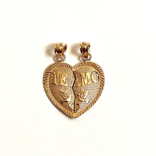 Solid gold Te Amo Breakable charm. Heart shape it has two birds on it and wrote Te Amo on it. it has a crack between two parts of heart so it can get separated and gifted to the loved one. 