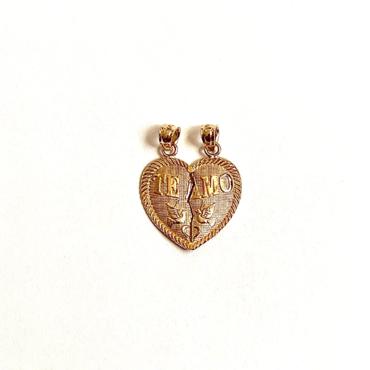 Solid gold Te Amo Breakable charm. Heart shape it has two birds on it and wrote Te Amo on it. it has a crack between two parts of heart so it can get separated and gifted to the loved one. 
