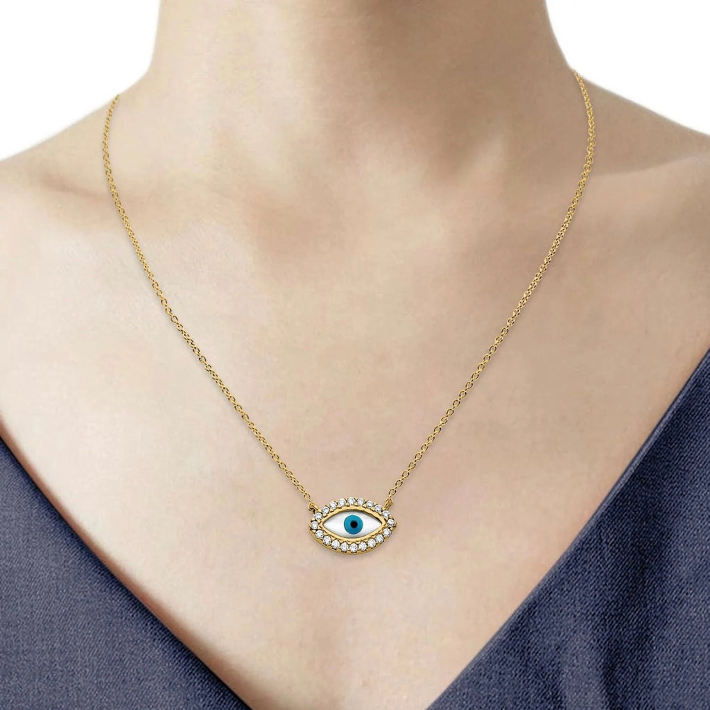 3D image of adjustable yellow gold evil eye necklace with a captivating eye-shaped design adorned with sparkling cubic zirconia around the eye. This picture is on a model.