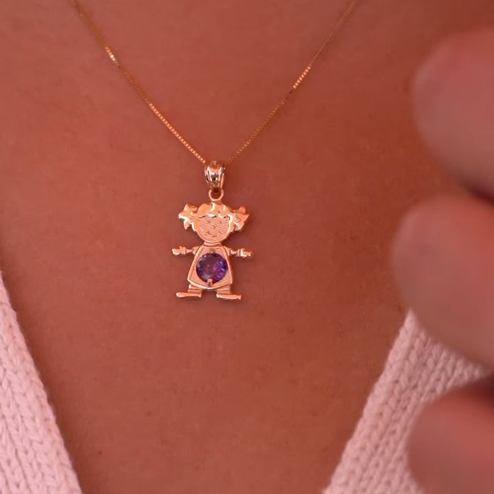 Woman wearing 14K solid gold girl charm with February light purple birthstone pendant on a necklace chain.