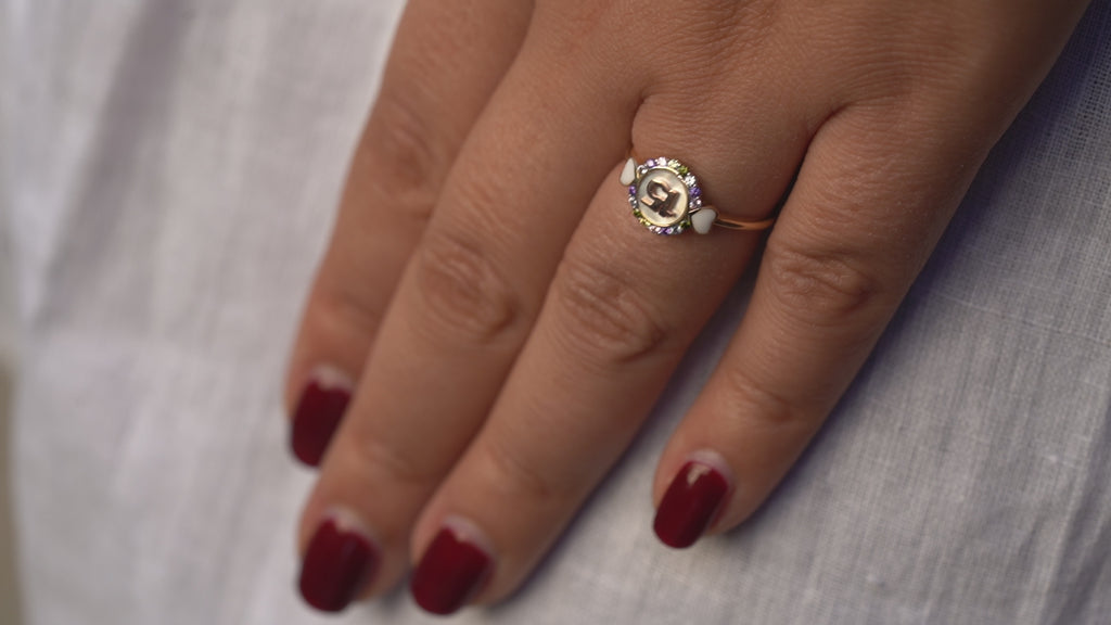 Video of a model wearing the 14K Gold 15 Years CZ Ring, showcasing its sparkling cubic zirconia accents, elegant ‘15’ design, and polished gold finish, perfect for a quinceañera celebration.