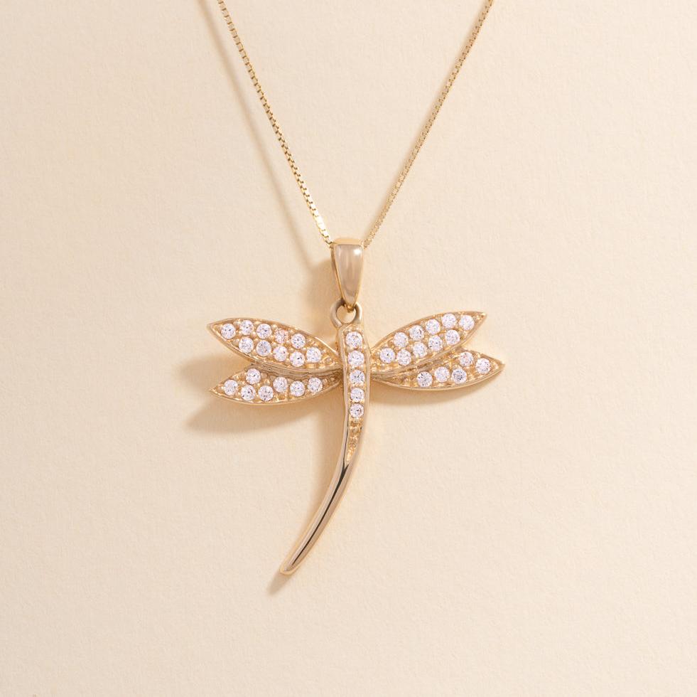 14K Solid Gold Dragonfly Pendant with Cubic Zirconia on gold chain, displayed on plain background.